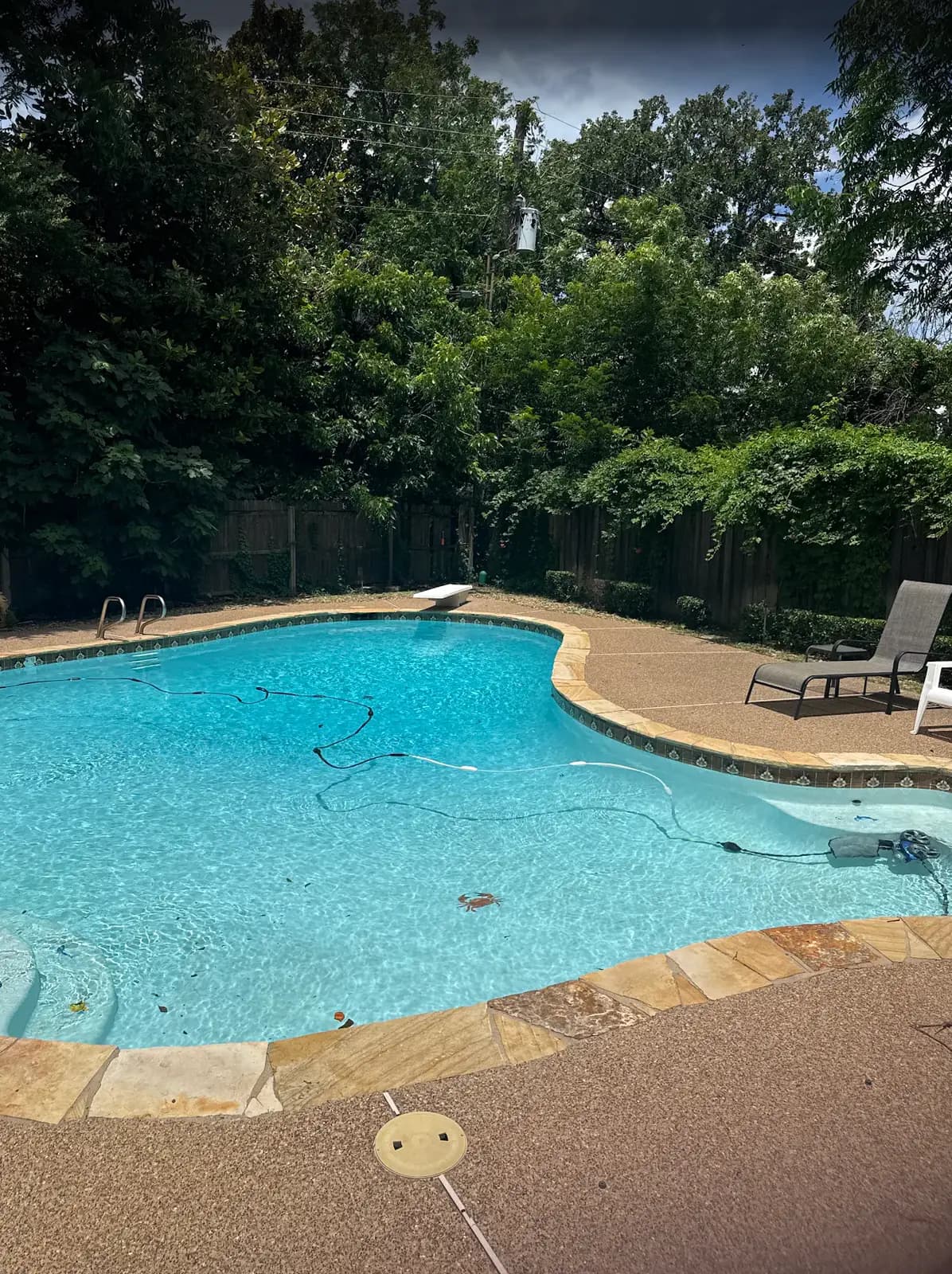 Backyard pool serviced by Buff Pools, shared in a customer's Google review
