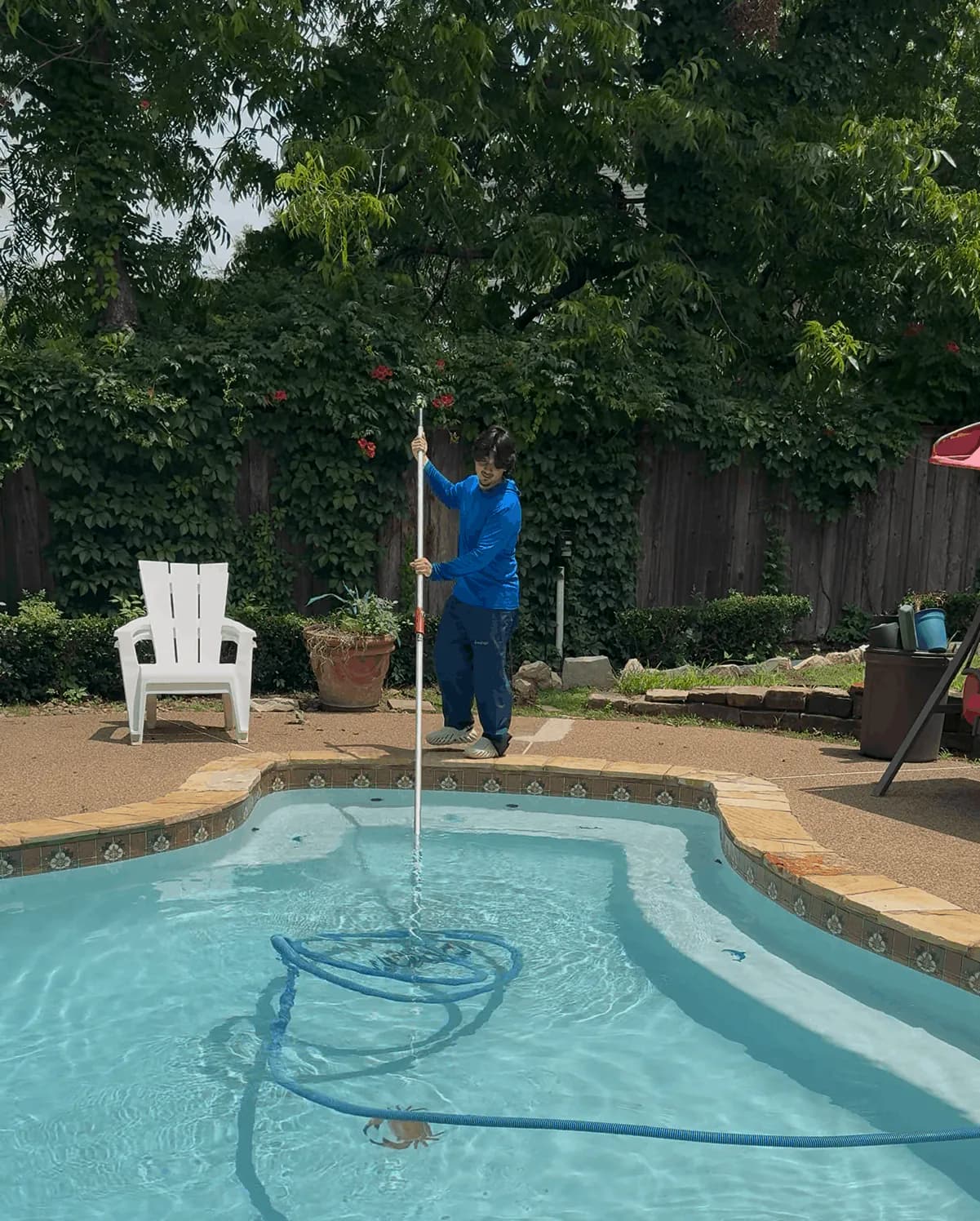 Backyard pool cleaned and balanced by the Buff Pools crew